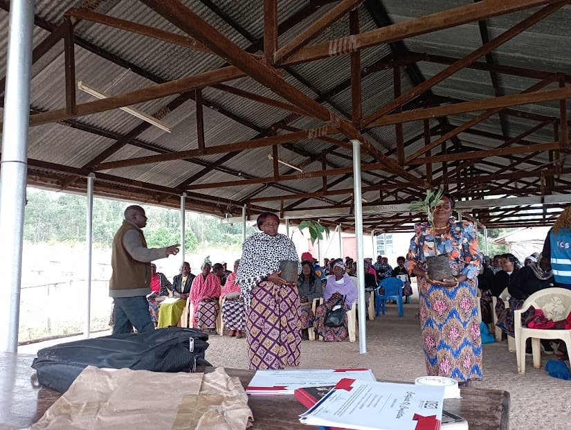 Farmer Training demonstrating seedling care